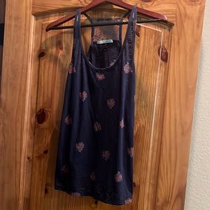 Maurice’s navy tank with lace inset